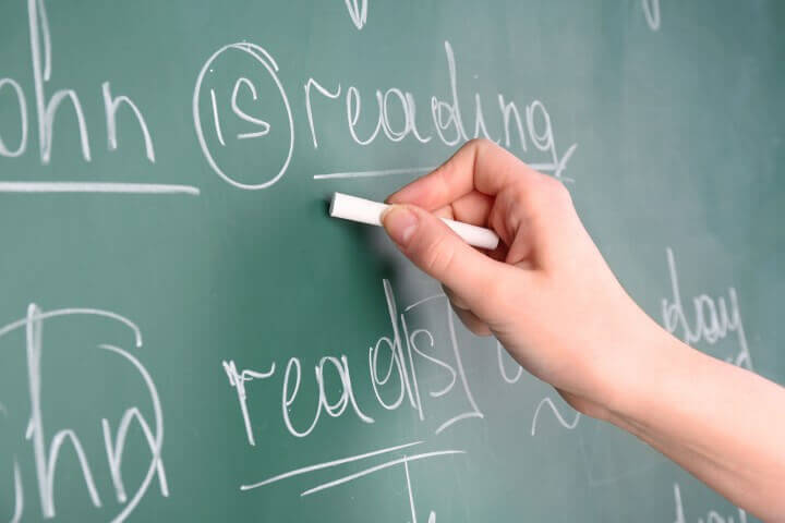 Teacher Hand Writing Grammar S
